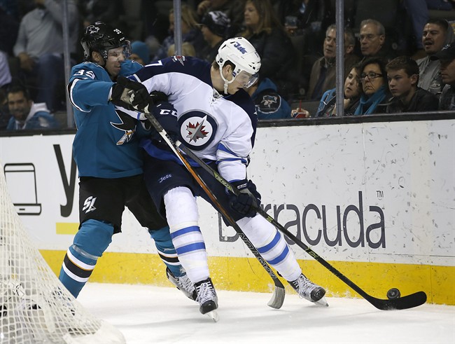 Connor Hellebuyck makes 27 saves; Jets get rare road win, beat Sharks 4-1 | iNFOnews.ca CP35880123