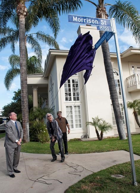 2 members of rock's Doors are joined in signage on LA street | iNFOnews.ca