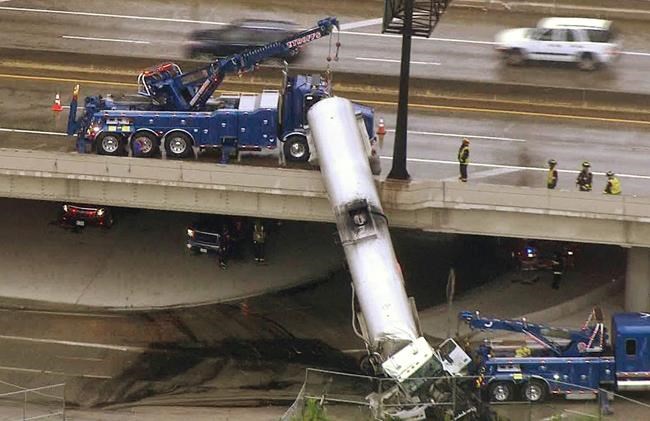 Tanker left dangling from overpass after interstate crash | iNFOnews.ca Tanker left dangling from overpass after interstate crash | iNFOnews.ca