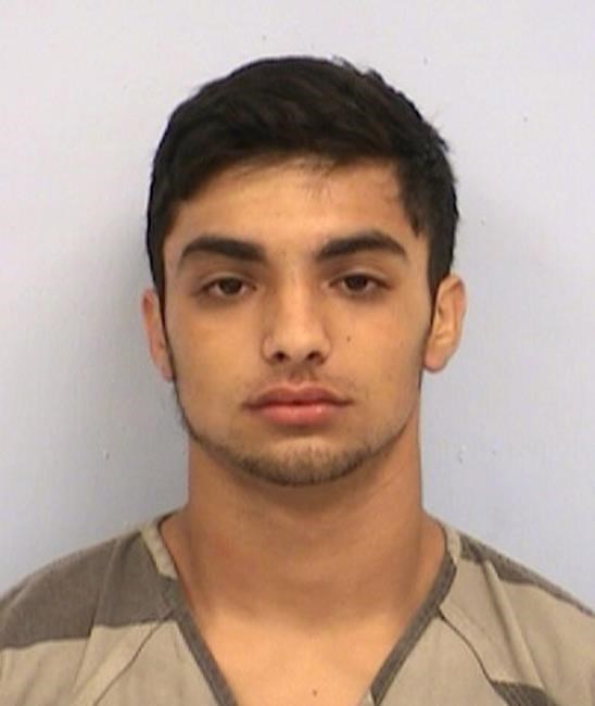 Handcuffed Texas suspect who shot himself has died | iNFOnews.ca