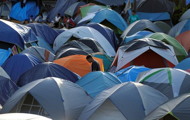 Birth on a riverbank: Woman's ordeal shows risks at border | iNFOnews.ca