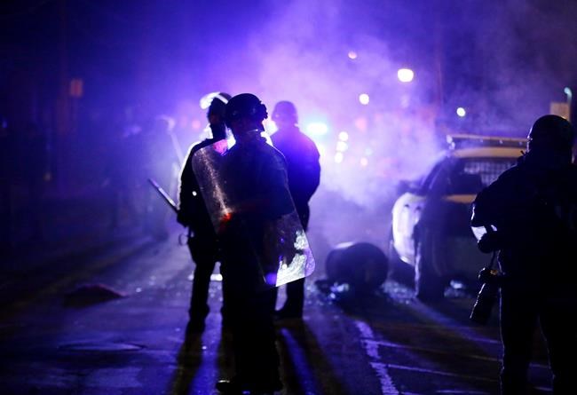 Watchdog says Ferguson behind on police, court changes | iNFOnews.ca