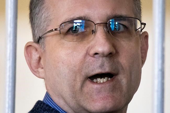 US man jailed in Russia on spying charges loses job | iNFOnews.ca CP690929337