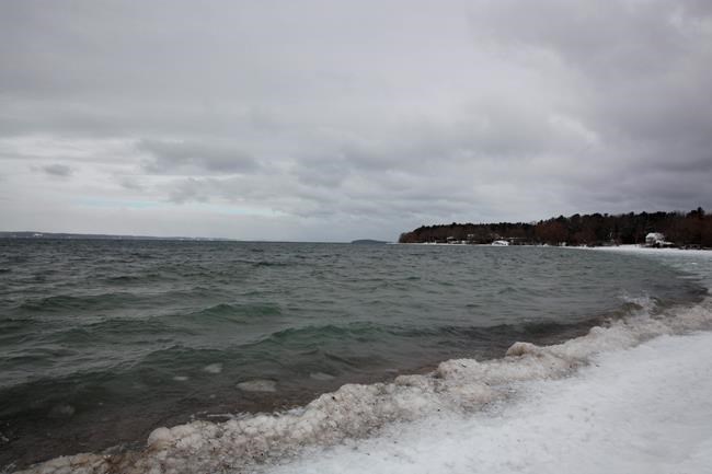 Gun provocation reveals tensions in Michigan tourist haven | iNFOnews.ca