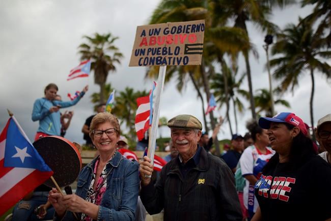 Puerto Ricans protest in anger over unused emergency aid | iNFOnews.ca Puerto Ricans protest in anger over unused emergency aid | iNFOnews.ca