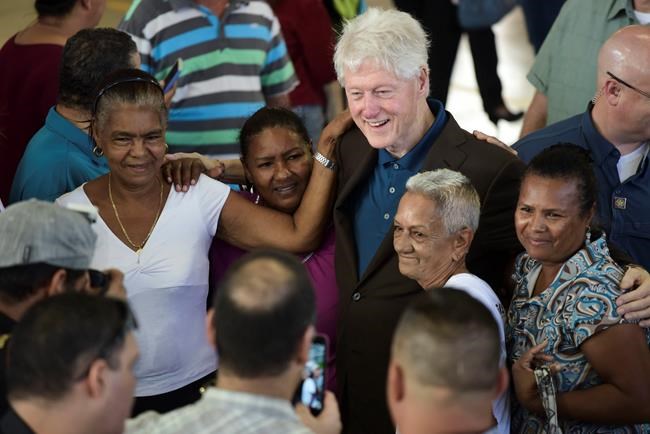Bill Clinton visits Puerto Rico, distributes relief supplies | iNFOnews.ca Bill Clinton visits Puerto Rico, distributes relief supplies | iNFOnews.ca