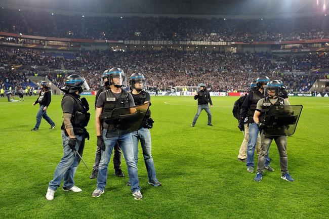Fan disorder delays Lyon-Besiktas game in Europa League QFs | iNFOnews.ca Fan disorder delays Lyon-Besiktas game in Europa League QFs | iNFOnews.ca