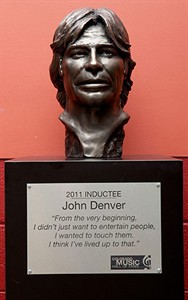 Radio station pleading for return of John Denver bust missing after heavy-metal Halloween ball | iNFOnews.ca