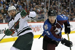 MacKinnon's OT goal lifts Avalanche to 4-3 win over Wild; take 3-2 lead in series | iNFOnews.ca CP28149250