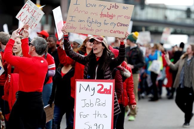The Latest: Denver teachers compromise on bonus pay | iNFOnews.ca