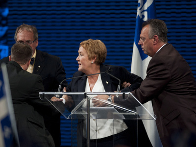 Report on Parti Quebecois election shooting cites police communication problems | iNFOnews.ca CP21910550
