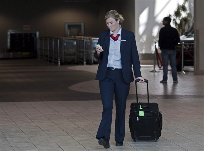 Air Canada flight attendants approve 10-year contract | iNFOnews.ca CP35368002