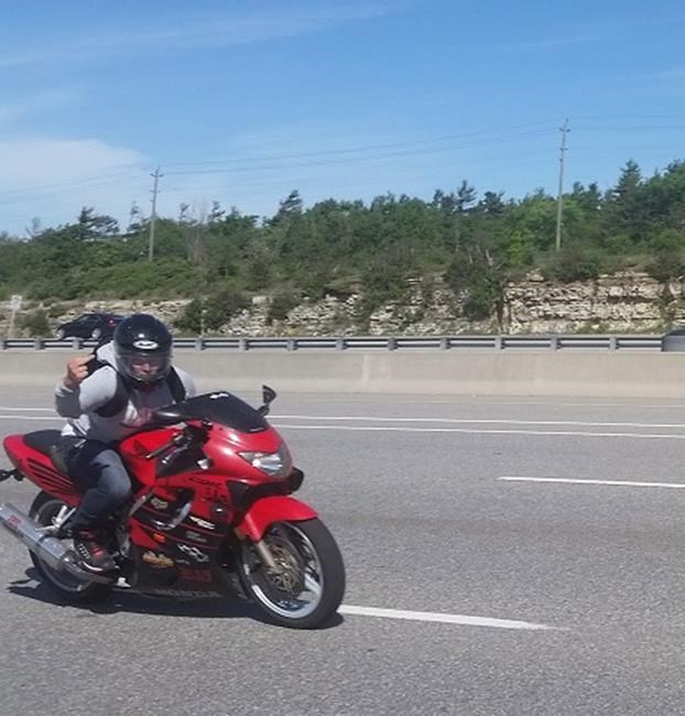 Motorcyclist charged after allegedly pointing gun at slow drivers: police | iNFOnews.ca
