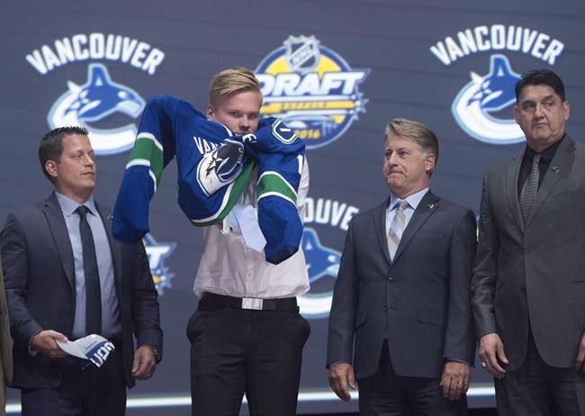 Canucks sign defenceman Olli Juolevi to three-year entry level contract | iNFOnews.ca
