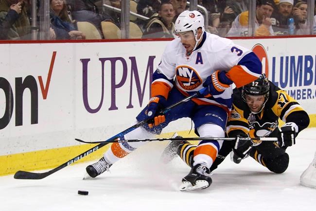 Defenceman Travis Hamonic traded to Flames from Islanders at NHL draft for picks | iNFOnews.ca