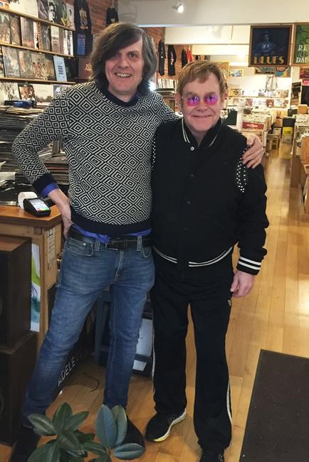 Elton John pops into a Vancouver record store to pick up some vinyl | iNFOnews.ca