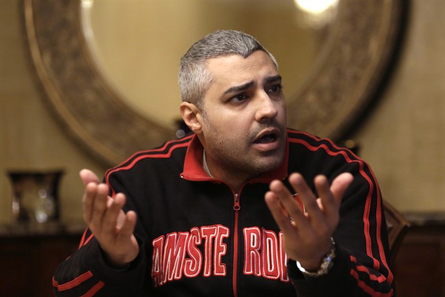 Mohamed Fahmy files $100M lawsuit against his employer Al Jazeera | iNFOnews.ca CP33050025