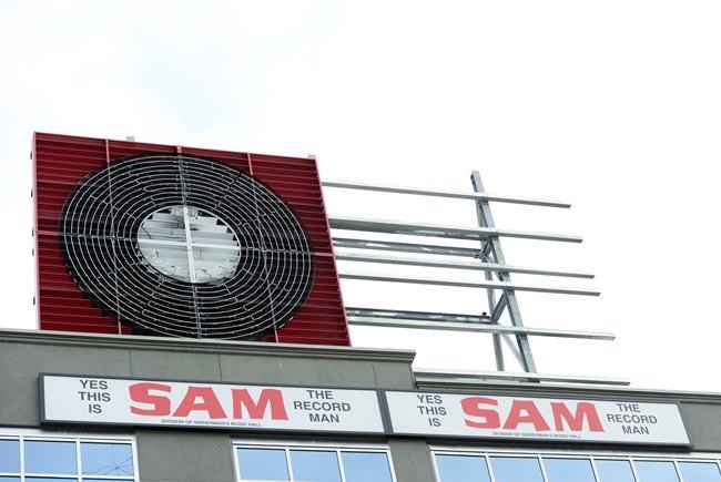 Landmark Sam the Record Man sign on the rise again in downtown Toronto | iNFOnews.ca