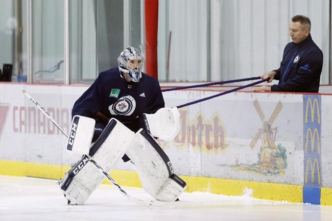 Jets goalie Connor Hellebuyck feeling right at home after signing extension | iNFOnews.ca