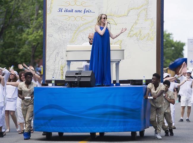 Fete nationale parade organizers apologize for float pushed by black teenagers | iNFOnews.ca Fete nationale parade organizers apologize for float pushed by black teenagers | iNFOnews.ca