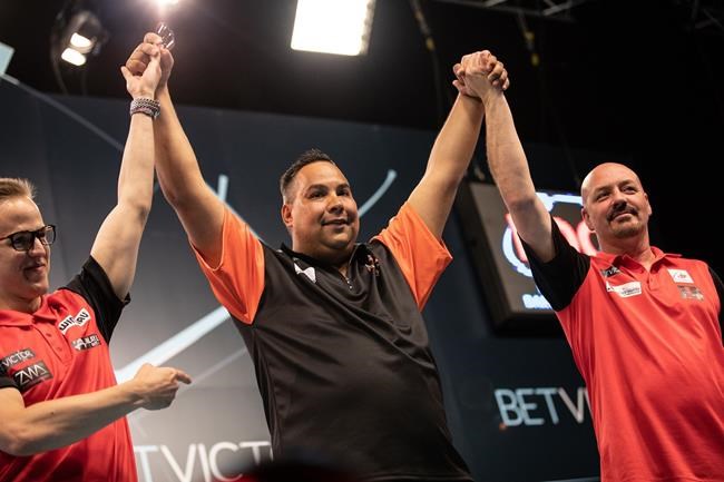 Canada's Dawson Murschell upsets world No. 1 in BetVictor World Cup of Darts. | iNFOnews.ca CP507413512