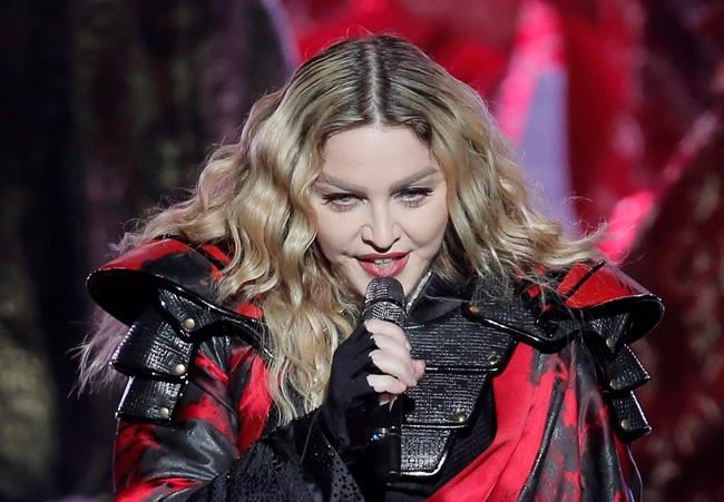 Court official: Madonna, Ritchie resolve son's custody case | iNFOnews.ca