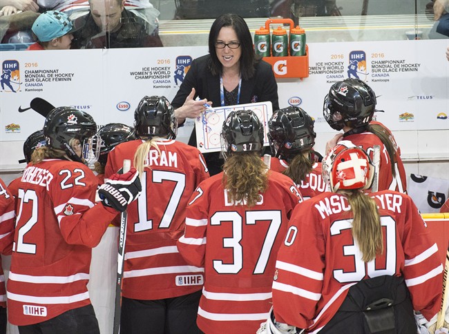 Schuler goes from wearing Maple Leaf to coaching it in women's world hockey | iNFOnews.ca CP36943781