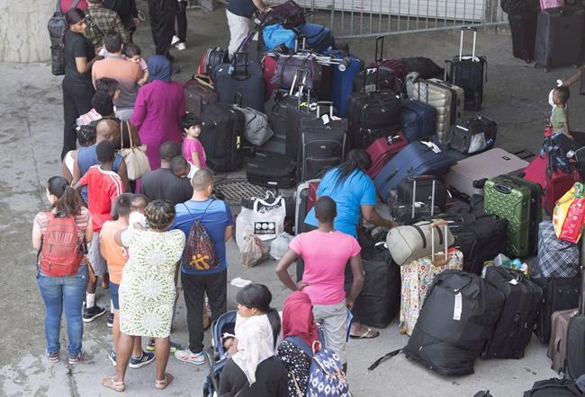 Border agents diverted to help with asylum influx; union fears travel delays | iNFOnews.ca