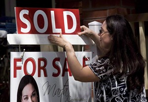 Freedom 58? Half of Canadians doing more to pay down their mortgages, says CIBC | iNFOnews.ca CP29206213