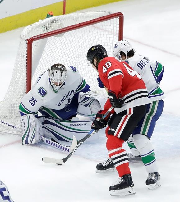 Canucks beat Blackhawks 5-2, stop 7-game slide | iNFOnews.ca Canucks beat Blackhawks 5-2, stop 7-game slide | iNFOnews.ca