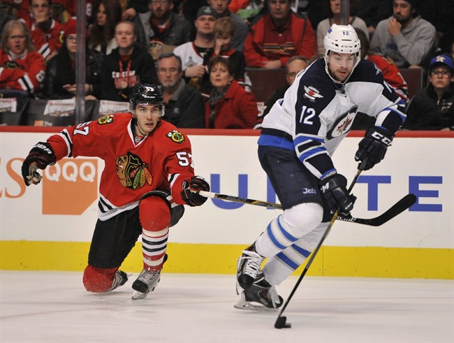 Kane's points streak reaches 25 games, Crawford has third shutout as Blackhawks beat Jets 2-0 | iNFOnews.ca CP35659731