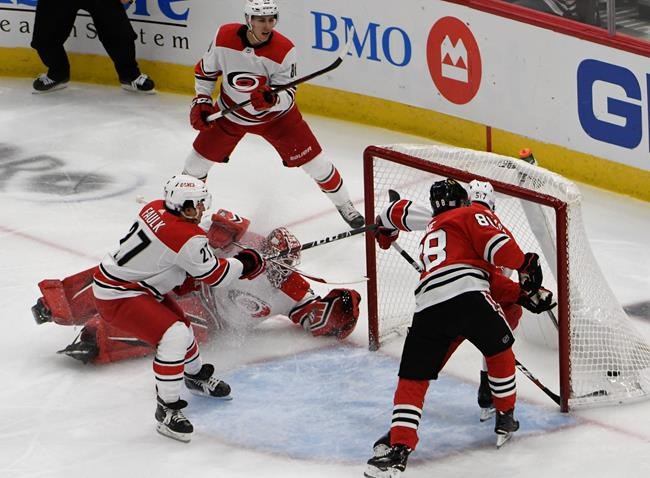 Canes hold on to beat Blackhawks 4-3, spoil Colliton's debut | iNFOnews.ca