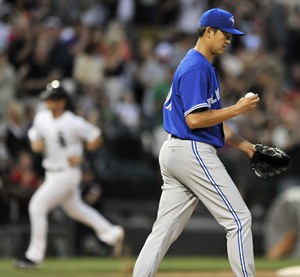 Bautista ties it with HR, Davis scores on WP to lead Blue Jays to 7-5 win over White Sox in 10 | iNFOnews.ca CP23772039