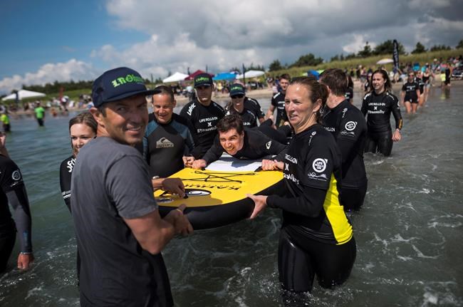 Surfers with disabilities find freedom in the waves at Nova Scotia beach | iNFOnews.ca CP281197390