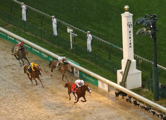 Justify wins sloppy Kentucky Derby, Baffert takes 5th title | iNFOnews.ca Justify wins sloppy Kentucky Derby, Baffert takes 5th title | iNFOnews.ca