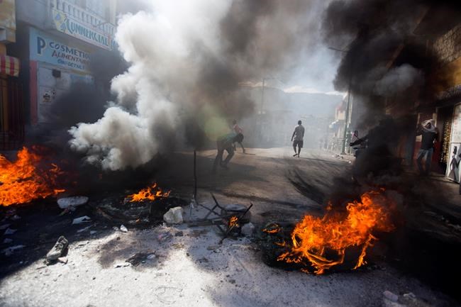1 killed, 3 wounded in Haiti amid violent protests | iNFOnews.ca