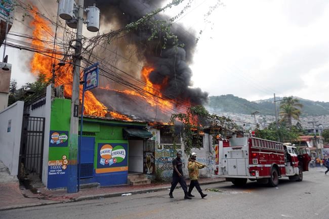 Protesters in Haiti burn businesses in push to oust leader | iNFOnews.ca