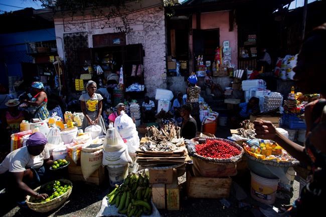 Haitians seek water, food as businesses reopen after protest | iNFOnews.ca CP205423877