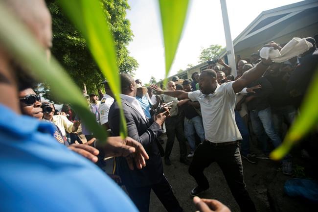 AP photographer wounded as senator fires gun during protest | iNFOnews.ca