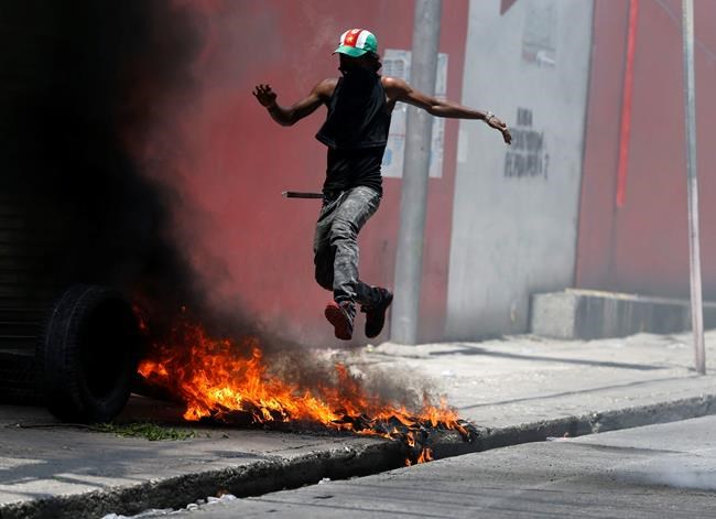 Strike paralyzes Haiti, protesters demand president's ouster | iNFOnews.ca Strike paralyzes Haiti, protesters demand president's ouster | iNFOnews.ca