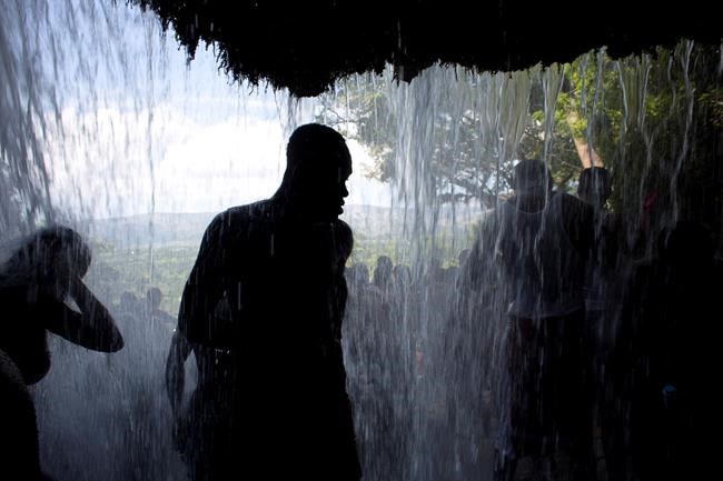 Haitians trek to sacred waterfalls in Voodoo festival | iNFOnews.ca Haitians trek to sacred waterfalls in Voodoo festival | iNFOnews.ca