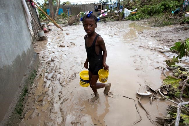 Haiti death toll jumps as receding waters reveal more bodies | iNFOnews.ca