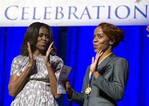 First lady to DC graduates: Don't avoid your struggles, conquer them | iNFOnews.ca CP28831352