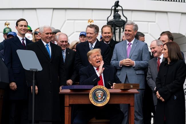 Trump celebrates major rewrite of North American trade rules | iNFOnews.ca