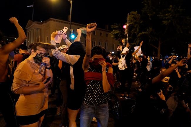 Washington man has some surprise guests: about 60 protesters | iNFOnews.ca
