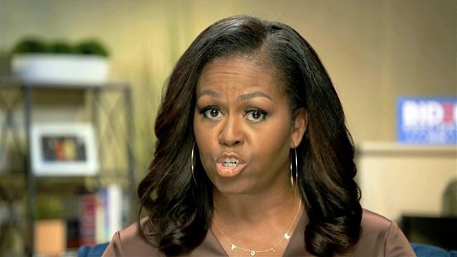 The Latest: Michelle Obama says vote like lives depend on it | iNFOnews.ca