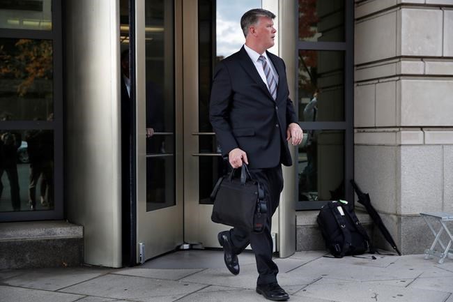 Judge not ready to remove ex-Trump aides from house arrest | iNFOnews.ca