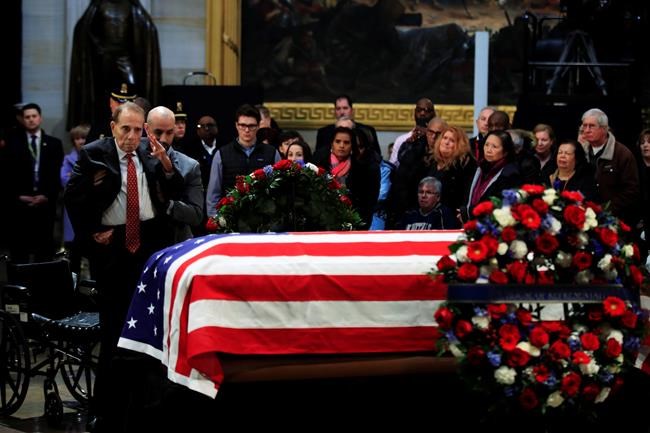 The Latest: George W. Bush greets mourners at Capitol | iNFOnews.ca The Latest: George W. Bush greets mourners at Capitol | iNFOnews.ca