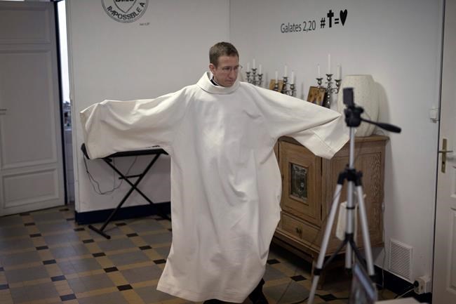 During virus, priests master livestream at Gothic cathedral | iNFOnews.ca