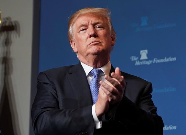 Under fire, Trump defends call to soldier's grieving family | iNFOnews.ca CP1686323681